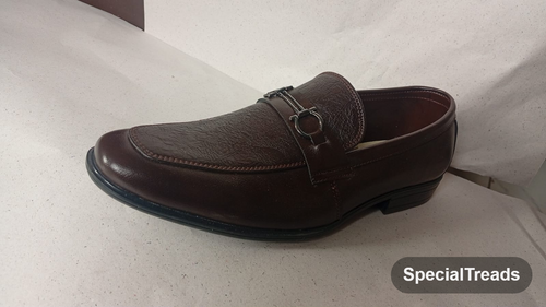 Dark brown embossed horsebit loafer side view