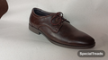 Dark brown derby dress shoe on Borjan box close-up view