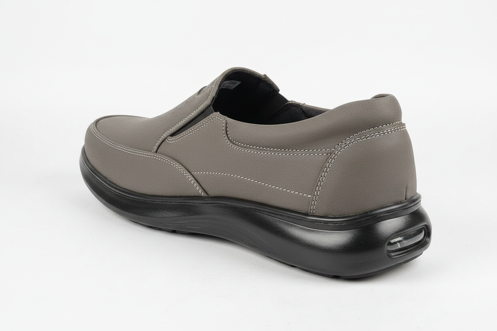 Taupe nubuck comfort loafer rear angle showing chunky air-cushion sole