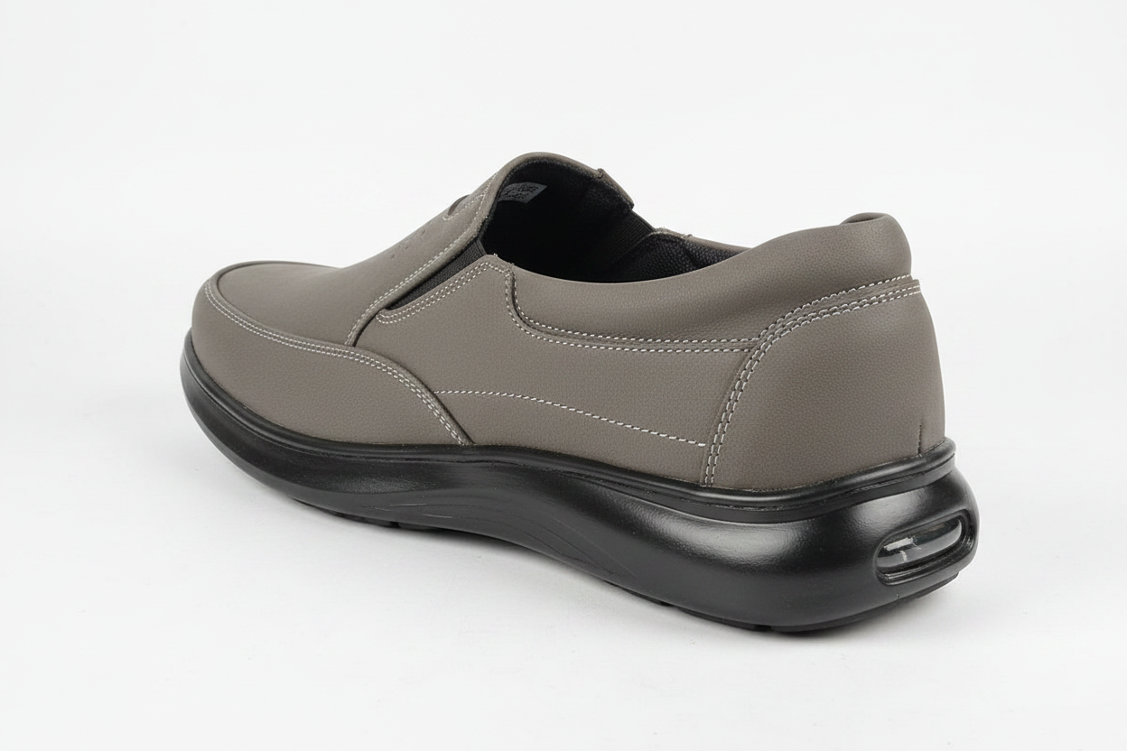 Taupe nubuck comfort loafer rear angle showing chunky air-cushion sole